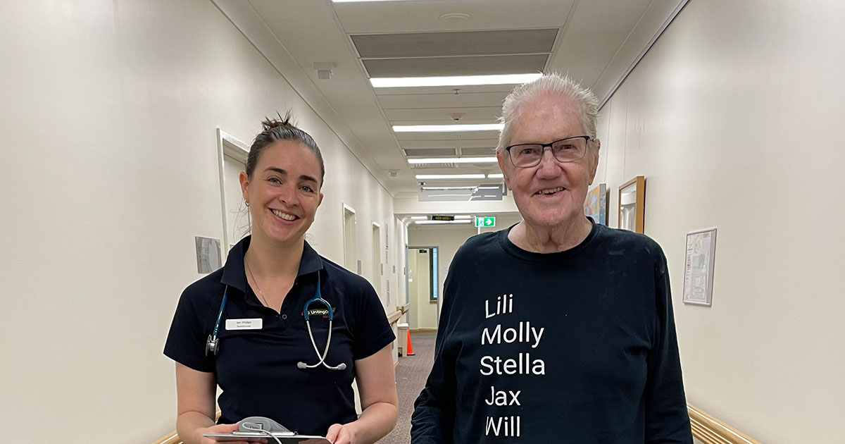 The Wesley Hospital Volunteer and General Manager posing for photo at awards night