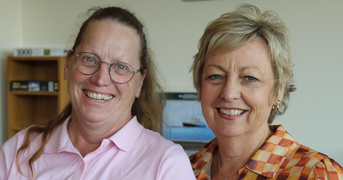 Corina Bradley with Breast Care Nurse Jan Snowdon smiling at camera