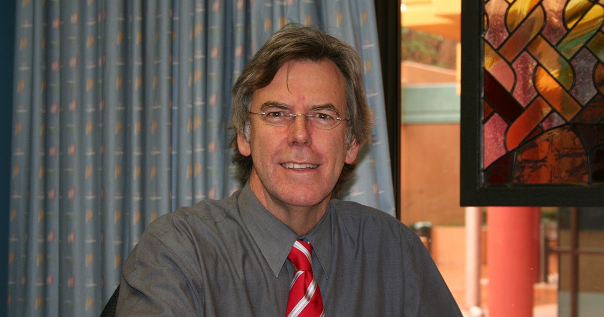 Cardiologist Associate Professor, David Colquhoun smiles at camera