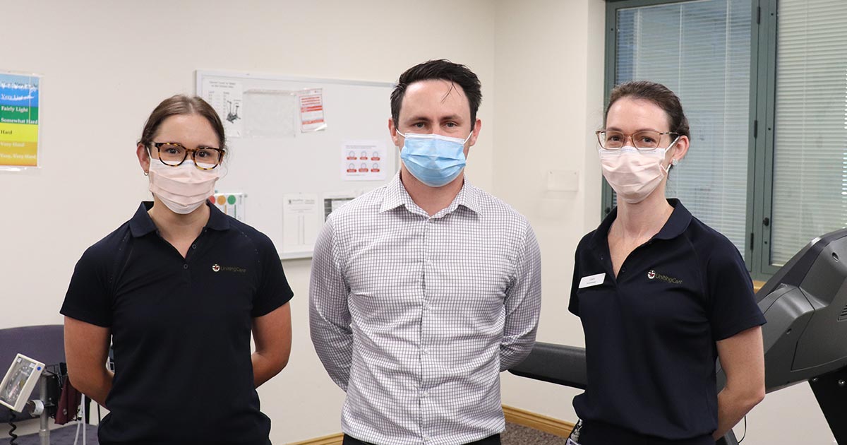 The Wesley Hospital Long COVID Clinic team wearing masks looking at camera