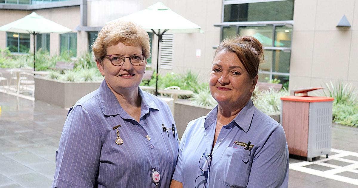 Two representatives from the IV Cannulation Team standing outside the Wesley Hospital