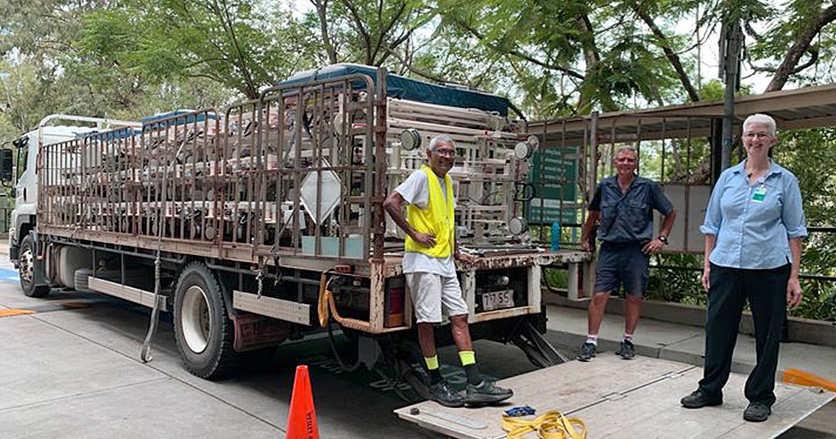 Clayre Gerrard Clinical Equipment Coordinator pictured next to a truck and driver outside The Wesley Hospital