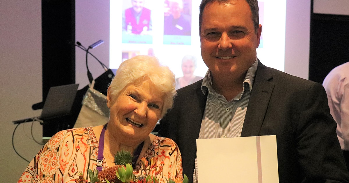 The Wesley Hospital Volunteer and General Manager posing for photo at awards night