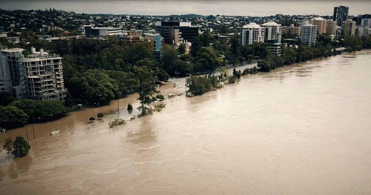 Brisbane river aerial shot of 2022 flooding along Coronation Drive near The Wesley Hospital