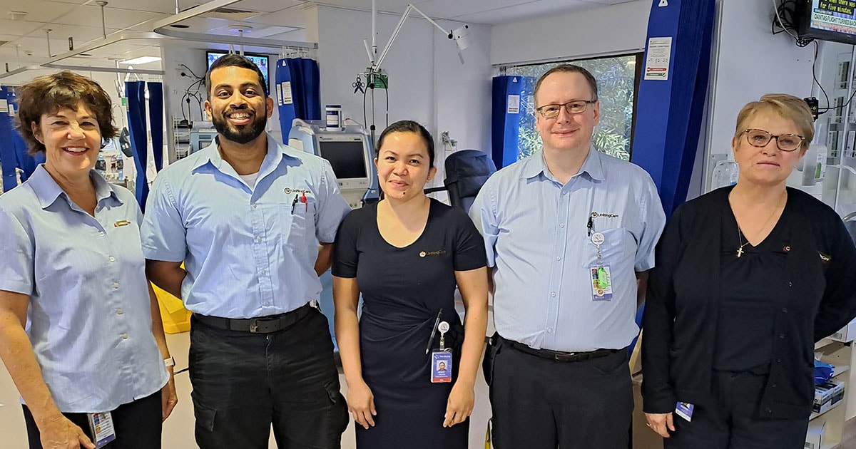 The Wesley Hospital staff members smiling at camera