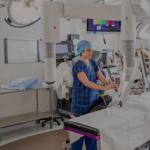 Be inspired – A young Graduate Nurse Program participant sets up equipment in a theatre at The Wesley Hospital.