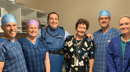 Cardiologists smiling in a group photo